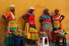 »Women in colourfull colombian dresses.«